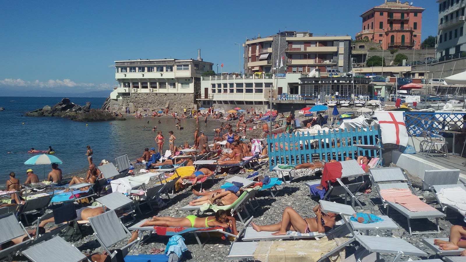 Foto av Spiaggia San Rocco med blått vatten yta