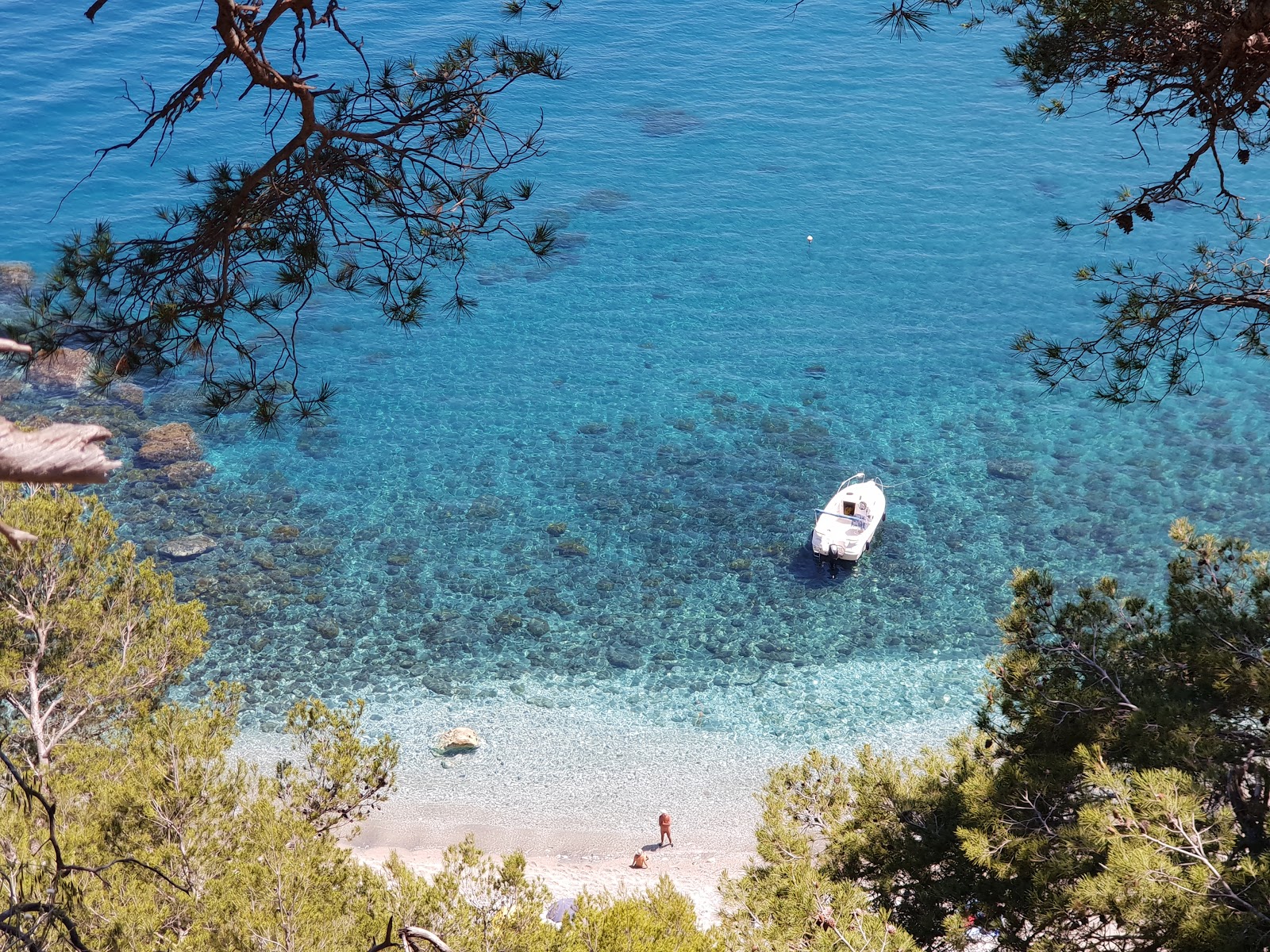 Foto av Plage du Jonquet med beige småsten yta