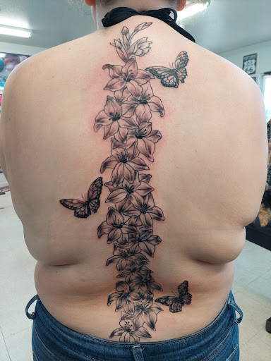 Explore tattoo ideas for female thigh, creative tattoo ideas in Fort Mohave, available at RedRum Tattoo & Body Piercing Co.