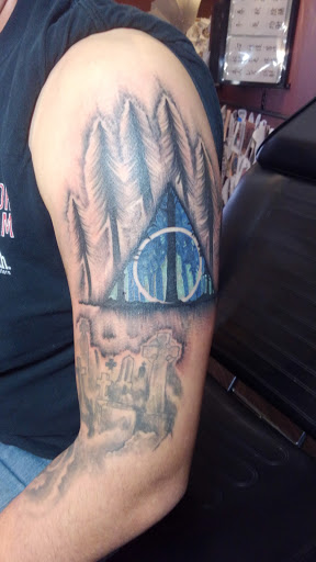 Explore forearm half sleeve cover up tattoo ideas, creative tattoo ideas in Huntsville, available at Blacktide Tattoo Co.