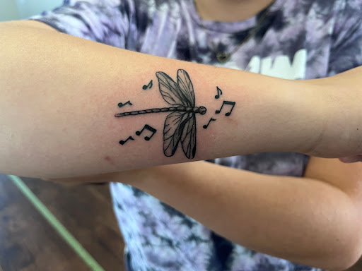 Explore strawberry shortcake tattoo ideas, creative tattoo ideas in Rogers, available at Ink Solutions Tattoo