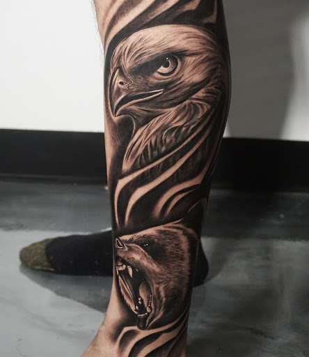 Explore men's clock tattoo ideas, creative tattoo ideas in Fayetteville, available at Sacred Raven Tattoo Shop