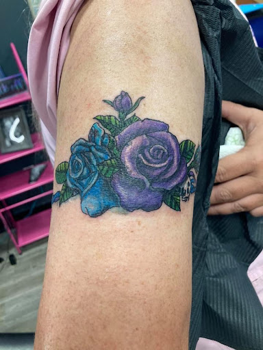 Explore tattoo ideas for women sleeve, creative tattoo ideas in Mineola, available at Kiss of Death Ink