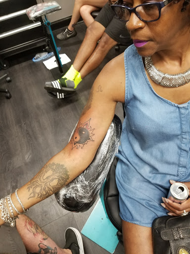 Tattoo Shop «Red Octopus Tattoos & Body Piercings», reviews and photos, 7465 Annapolis Rd, Hyattsville, MD 20784, USA