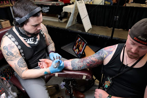 Explore thigh tattoo ideas male, creative tattoo ideas in Canton, available at The Inkeepers Tattoo Parlor