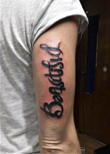 Explore cross tattoo ideas forearm, creative tattoo ideas in Carlinville, available at MaloneTattoo