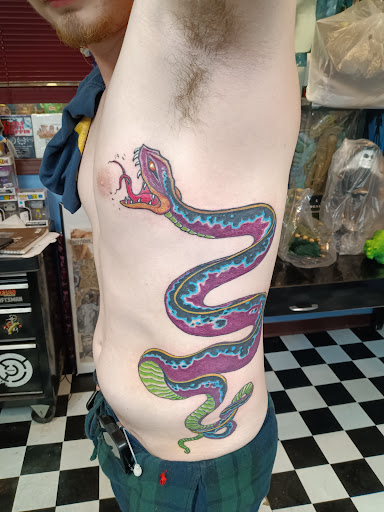 Explore helix tattoo ideas, creative tattoo ideas in Kansas City, available at Rose Tattoo Parlor