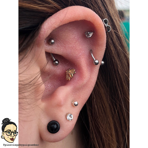 Explore name neck tattoo ideas, creative tattoo ideas in Oshkosh, available at Piercings by Paige at Big Guns Tattoo