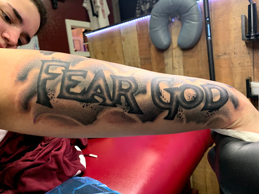 Find tattoo business cards ideas for your next unique tattoo in Cape Coral at UNRIVALED INK