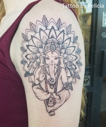 Explore tank tattoo ideas, creative tattoo ideas in Fort Myers, available at Tiger Lotus Tattoo and Piercing