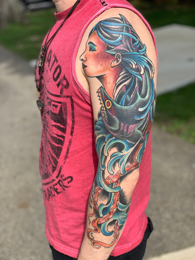 Explore tattoo ideas family, creative tattoo ideas in Powell, available at Hummingbird Tattoo Studio