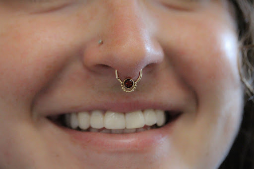 Explore love is pain tattoo ideas, creative tattoo ideas in Tallahassee, available at Magnolia Tattoo & Piercing Co.