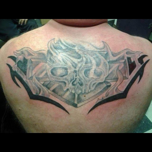 Explore grease tattoo ideas, creative tattoo ideas in Savannah, available at Tattoo Addictions