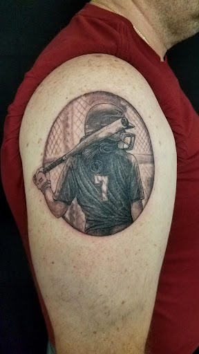 Explore saturn tattoo ideas, creative tattoo ideas in Toms River, available at Jersey Sure Lines Tattoo