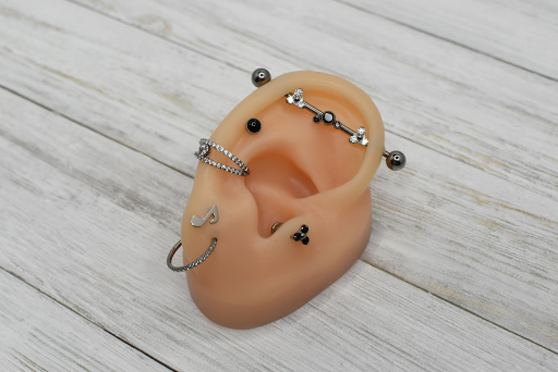 Explore back of leg tattoo ideas, creative tattoo ideas in Chesapeake, available at Finders Keepers Body Piercing