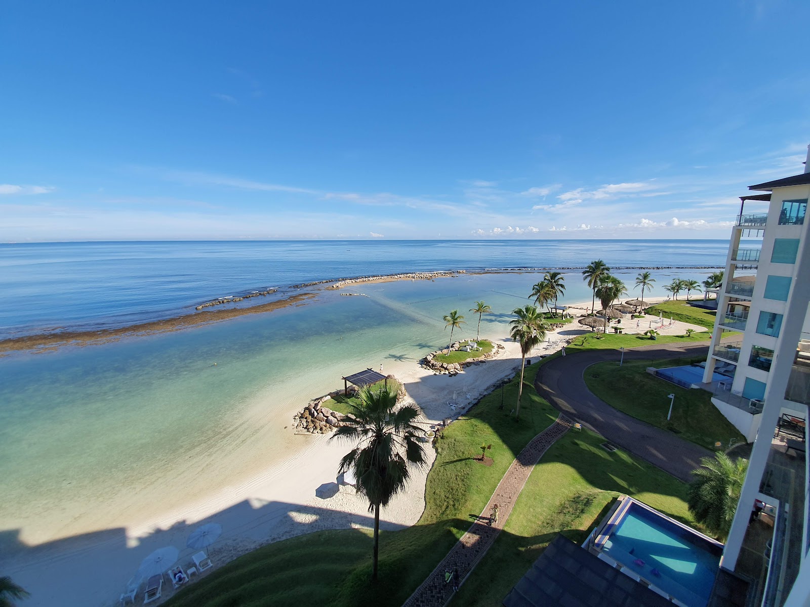 Foto van Escondida Beach met recht en lang