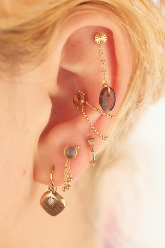 Explore tiki tattoo ideas, creative tattoo ideas in Buffalo, available at Moria Piercing and Jewelry