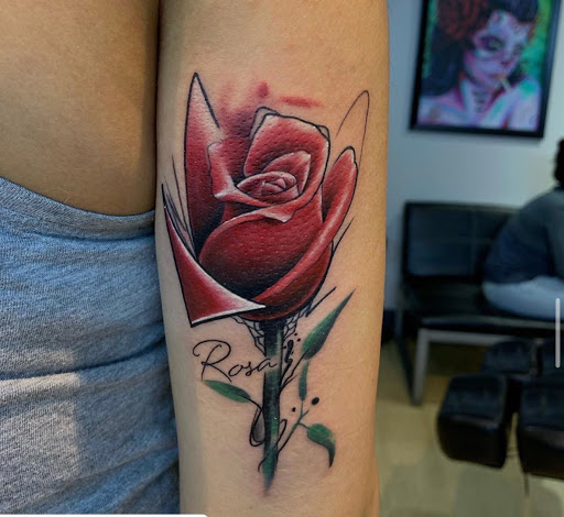 Explore belly button tattoo ideas, creative tattoo ideas in Fort Wayne, available at Grade A Tattoos and Body Piercing