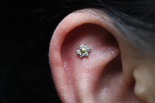 Explore triple moon tattoo ideas, creative tattoo ideas in West Palm Beach, available at Wooden Heart Tattoos and Piercings