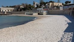Foto von Cala Colonna Beach und die siedlung