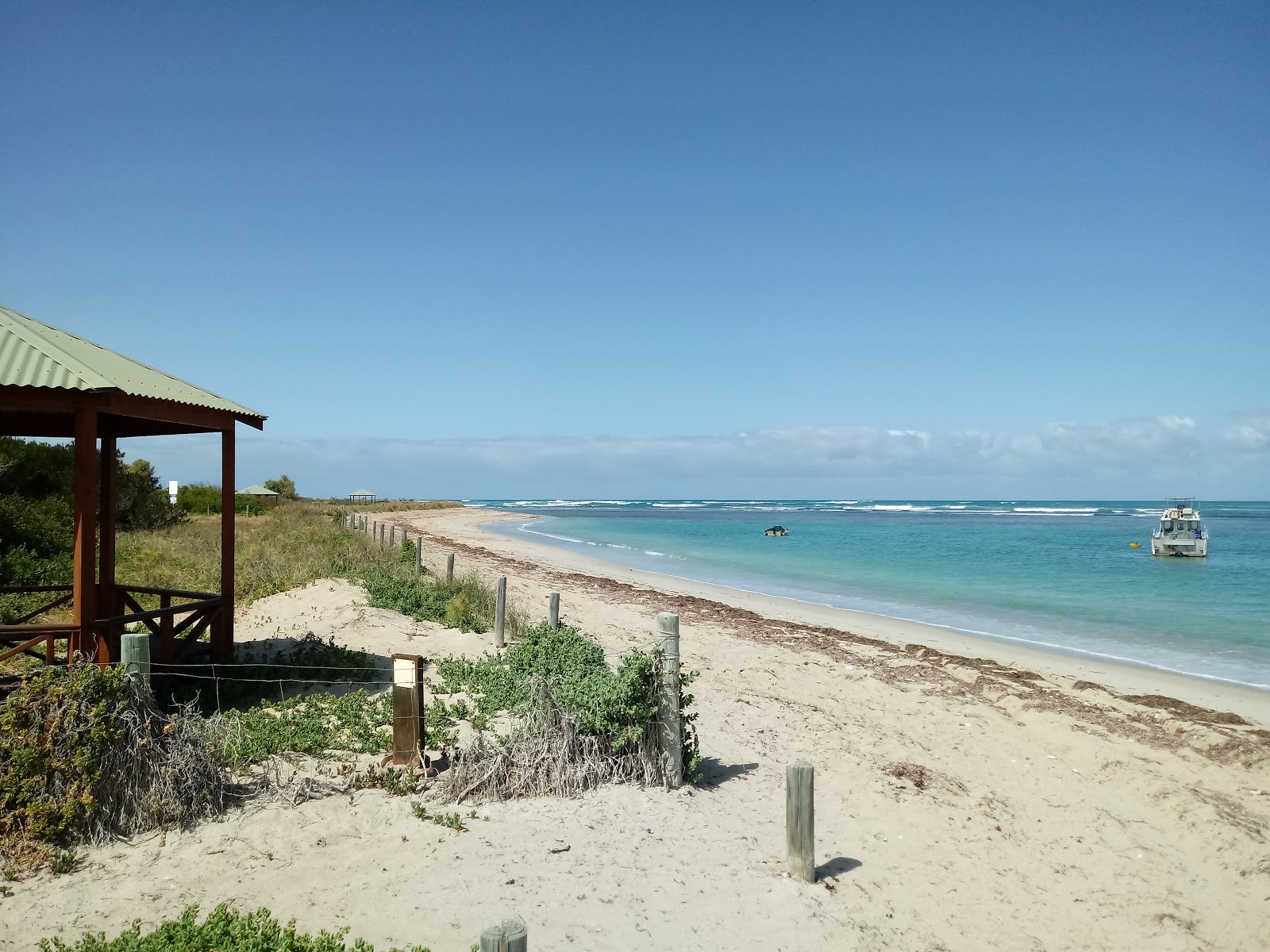 Fotografija Coronation Beach z turkizna čista voda površino