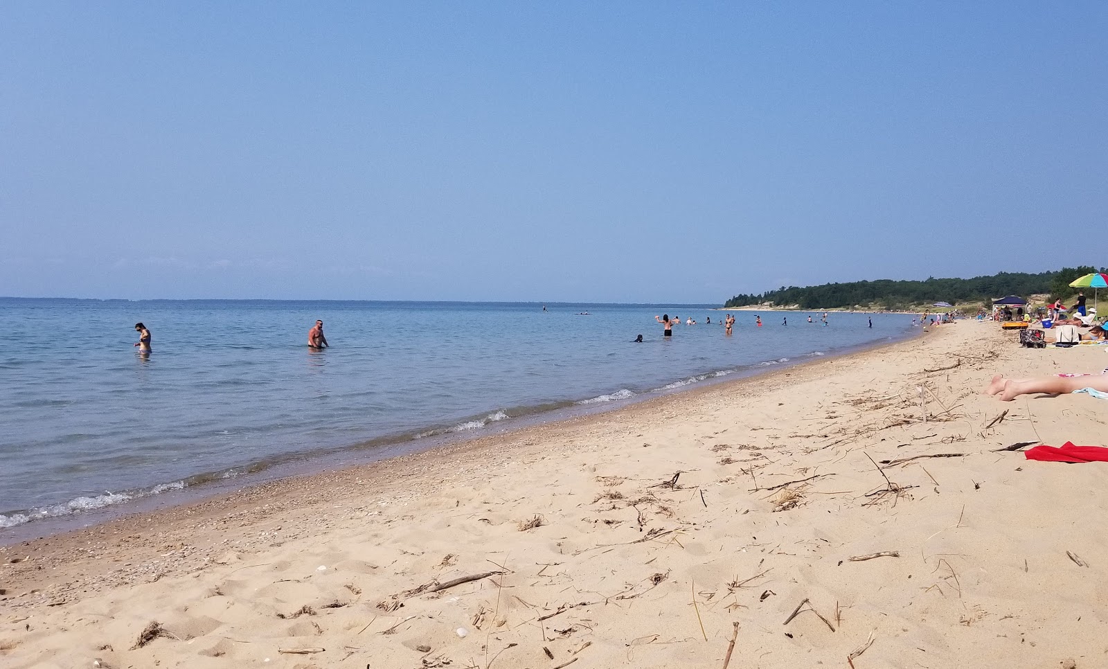Photo of Sturgeon Bay Beach with turquoise pure water surface
