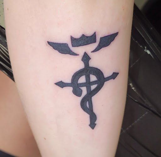 Explore half heart tattoo ideas, creative tattoo ideas in Plano, available at Vixen Body Art