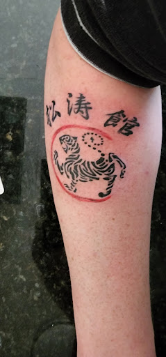 Explore cover up tattoo ideas for women, creative tattoo ideas in Canfield, available at Black Rose Tattoo Studio