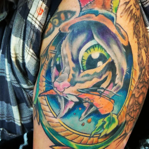 Explore kingfisher tattoo ideas, creative tattoo ideas in Bowling Green, available at Taboo Tattoos and Piercings