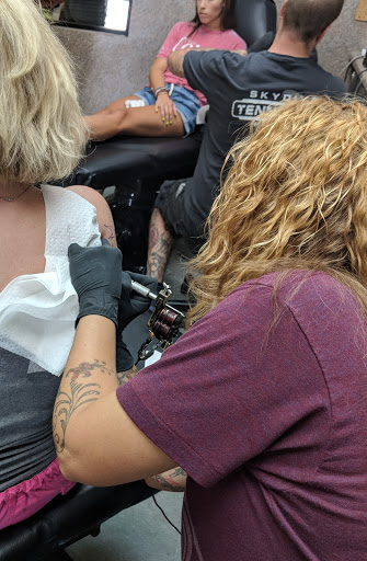 Explore foot tattoo ideas for men, creative tattoo ideas in Huntsville, available at Kreations Tattoos & Body Piercing