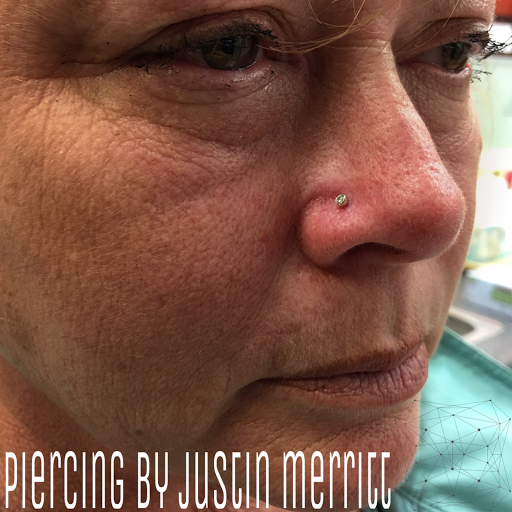 Explore lower stomach tattoo ideas, creative tattoo ideas in Hampton, available at Blue Horseshoe Tattoo and Body Piercing