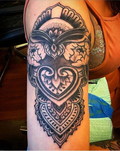 Explore hood tattoo ideas, creative tattoo ideas in Spokane, available at Feel Good Ink