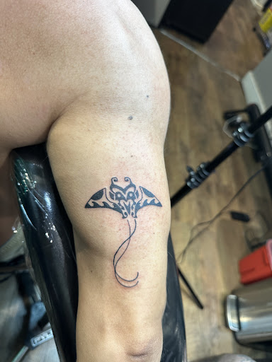 Explore outlaw tattoo ideas, creative tattoo ideas in Honolulu, available at Aloha Tattoo Waikiki Hilton Hawaiian Village Rainbow Bazaar