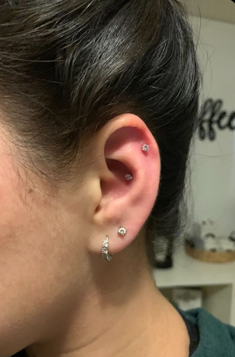 Find clock tattoo ideas for your next unique tattoo in Magnolia at Lucky Sparrow Tattoo Shop and Piercing