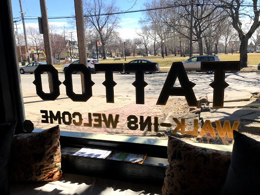 Explore life and death sleeve tattoo ideas, creative tattoo ideas in Cleveland, available at Kollective Tattoo Studio