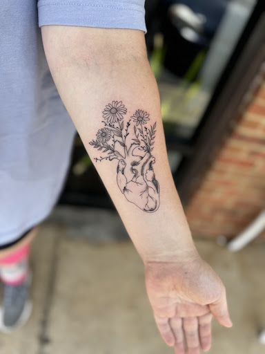 Explore mother son matching tattoo ideas, creative tattoo ideas in Indian Trail, available at Beauty in the ink, LLC