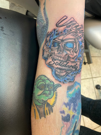 Explore sleeve tattoo filler ideas, creative tattoo ideas in Moundsville, available at Cherry Haze Tattoo