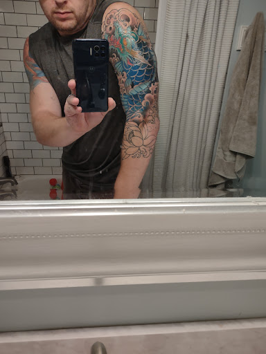 Explore matching husband and wife tattoo ideas, creative tattoo ideas in Bethlehem, available at Raygun Samurai Tattoo