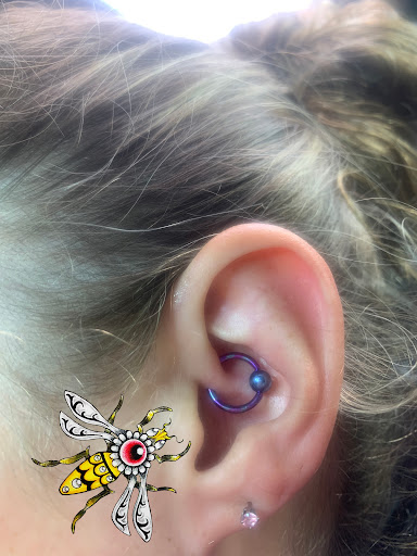 Explore earlobe tattoo ideas, creative tattoo ideas in Cherokee, available at Warriors Breath Permanent Cosmetics and Piercing Studio