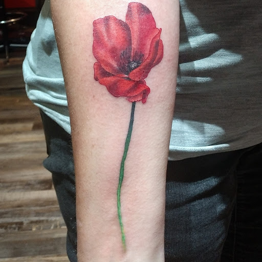 Explore tattoo ideas for a submissive, creative tattoo ideas in Lander, available at Blackblood Tattoo and Piercing