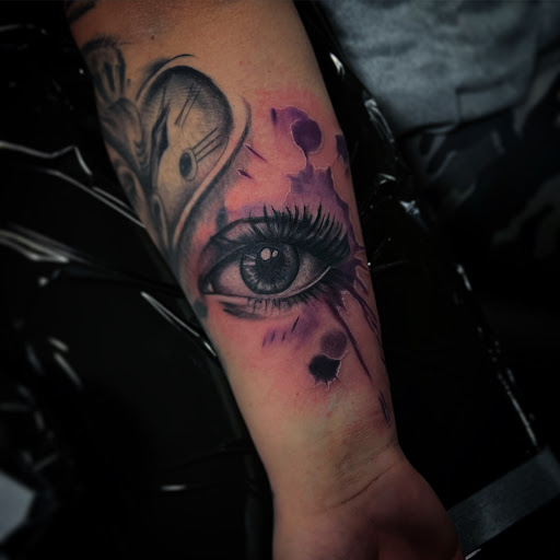 Explore name cover up tattoo ideas, creative tattoo ideas in Medina, available at Greasers Ink