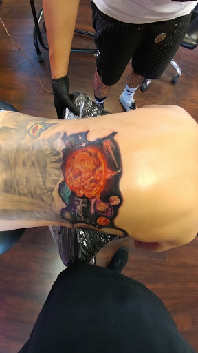 Explore female hand tattoo ideas, creative tattoo ideas in Mesa, available at Sea of Ink Tattoo Studio