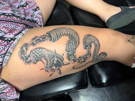Explore to the moon and back tattoo ideas, creative tattoo ideas in Tacoma, available at Make It Sick Tattoo