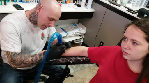 Explore birth tattoo ideas, creative tattoo ideas in Kansas City, available at Divine Tattoo Parlor