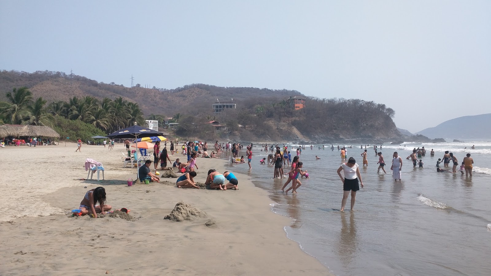 Valokuva Playa Ojo De Aguaista. ja asutus