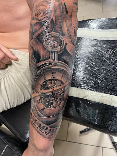 Explore train tattoo ideas, creative tattoo ideas in Sarasota, available at SEVEN SINS Tattoo Studio