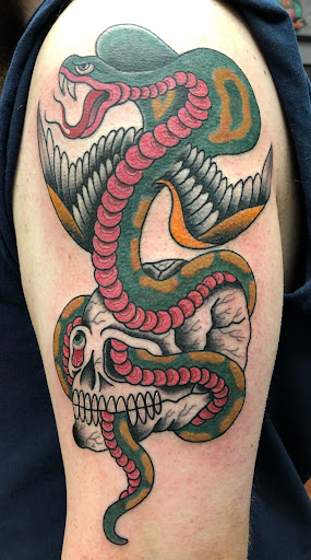 Explore cute cross tattoo ideas, creative tattoo ideas in Madison, available at ART IMMORTAL TATTOO