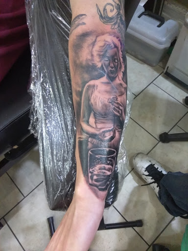 Find tattoo ideas about strength for your next unique tattoo in Atlanta at Iron Palm Tattoos & Body Piercing Atlanta