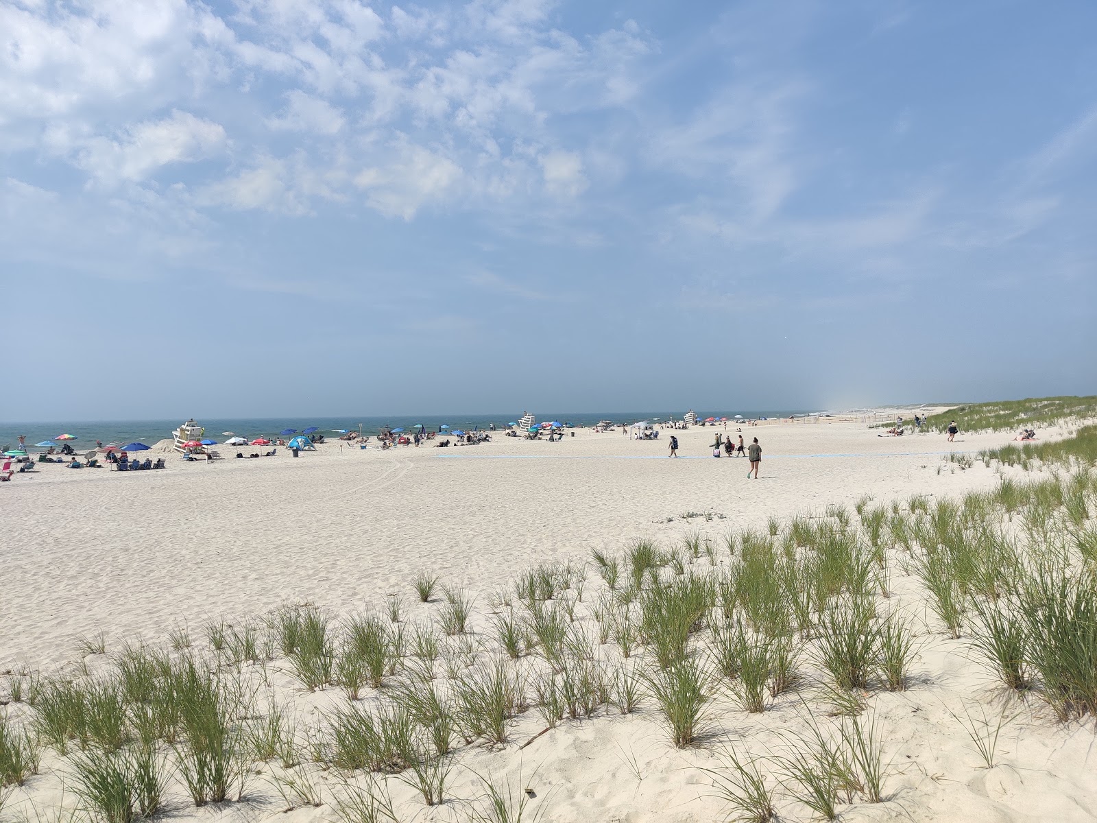 Photo of Ponquogue Beach with long straight shore