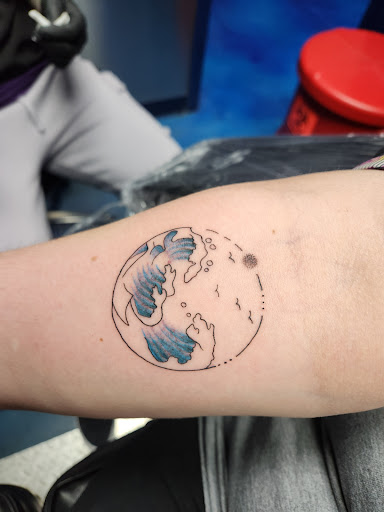 Explore tooled leather tattoo ideas, creative tattoo ideas in North Aurora, available at Ink Bar Tattoo